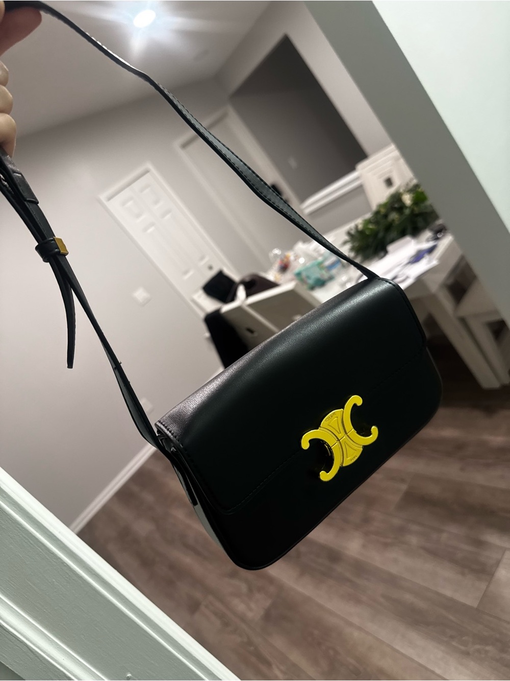 My sister’s Black Leather Shoulder Bag with Yellow Accent